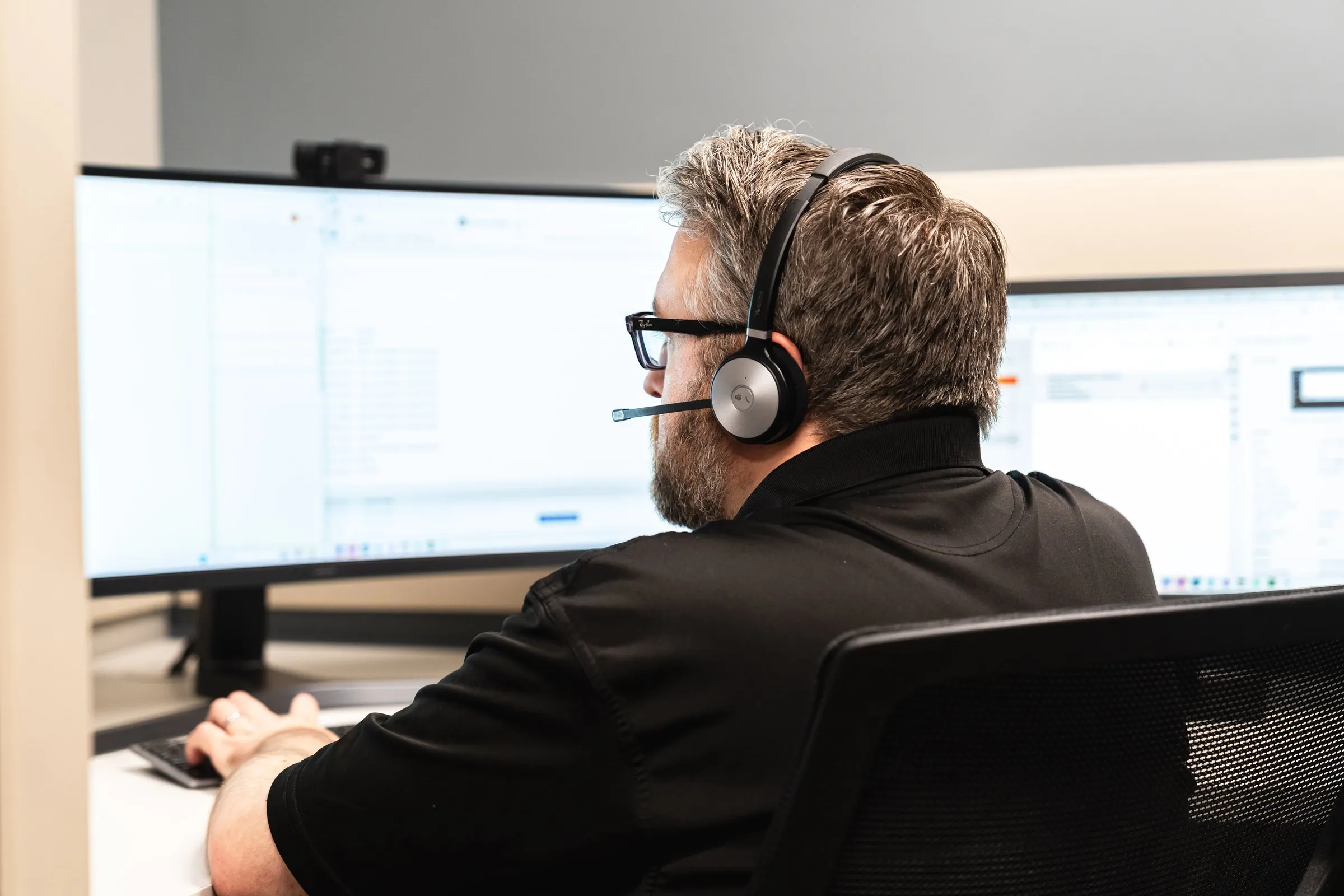 AJTC technician on a support call at the Chicago service desk