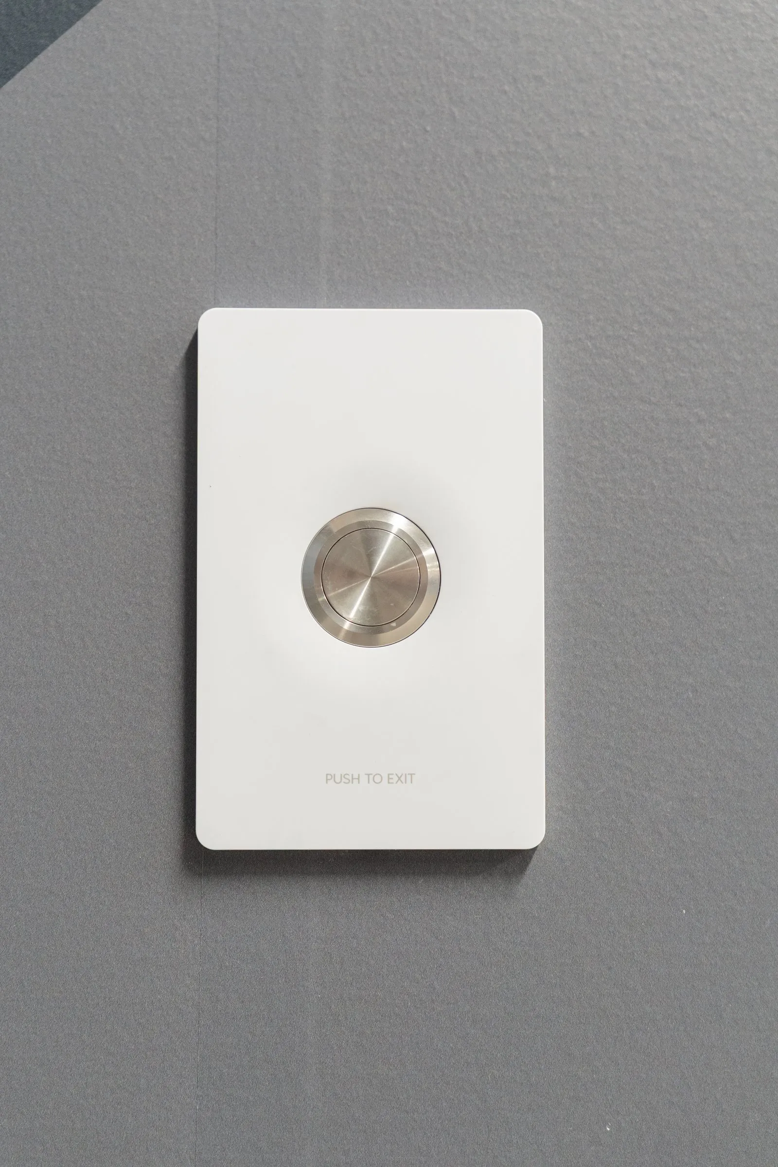 Magnetic door release button
