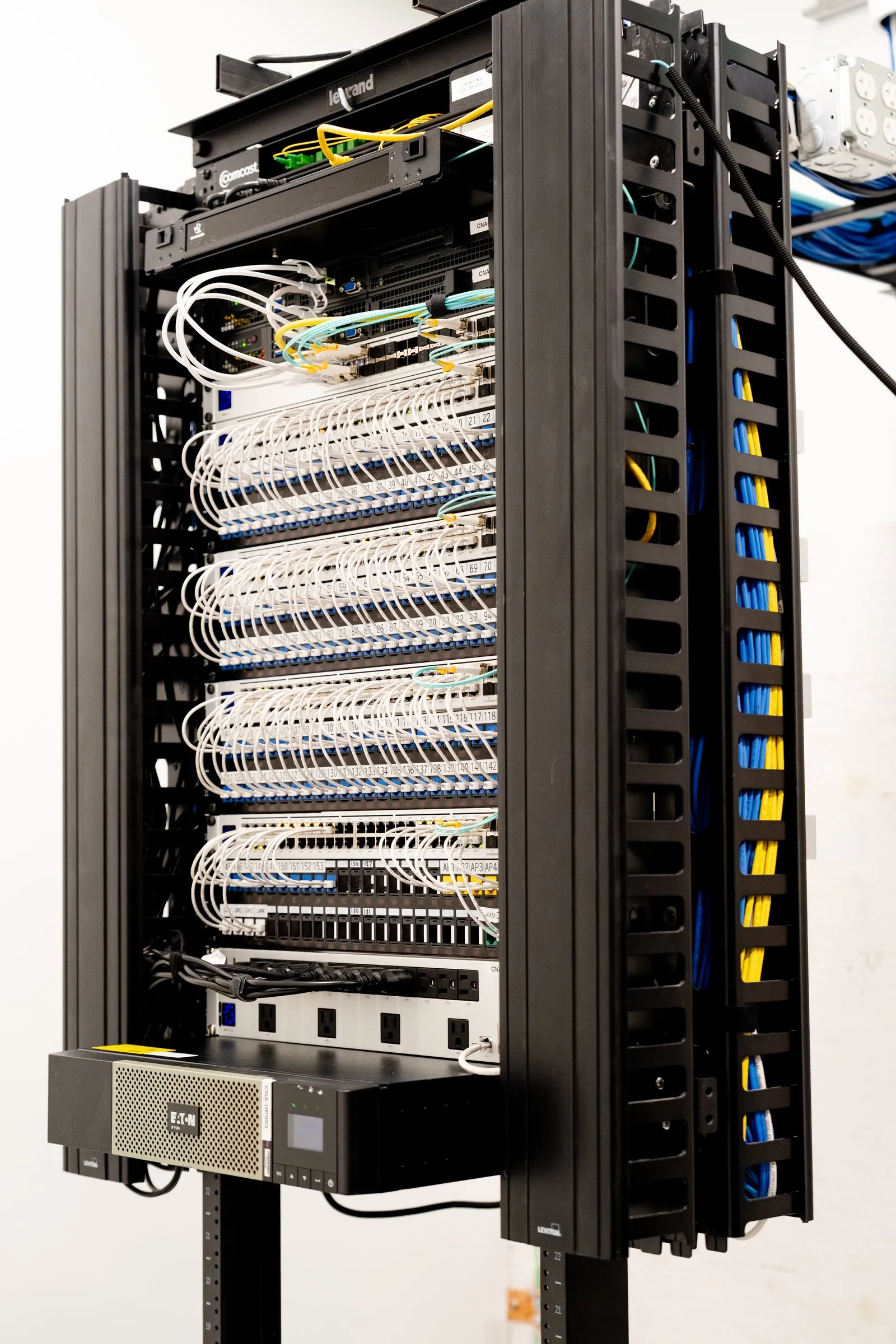 Fully cabled and organized network rack installed by AJTC