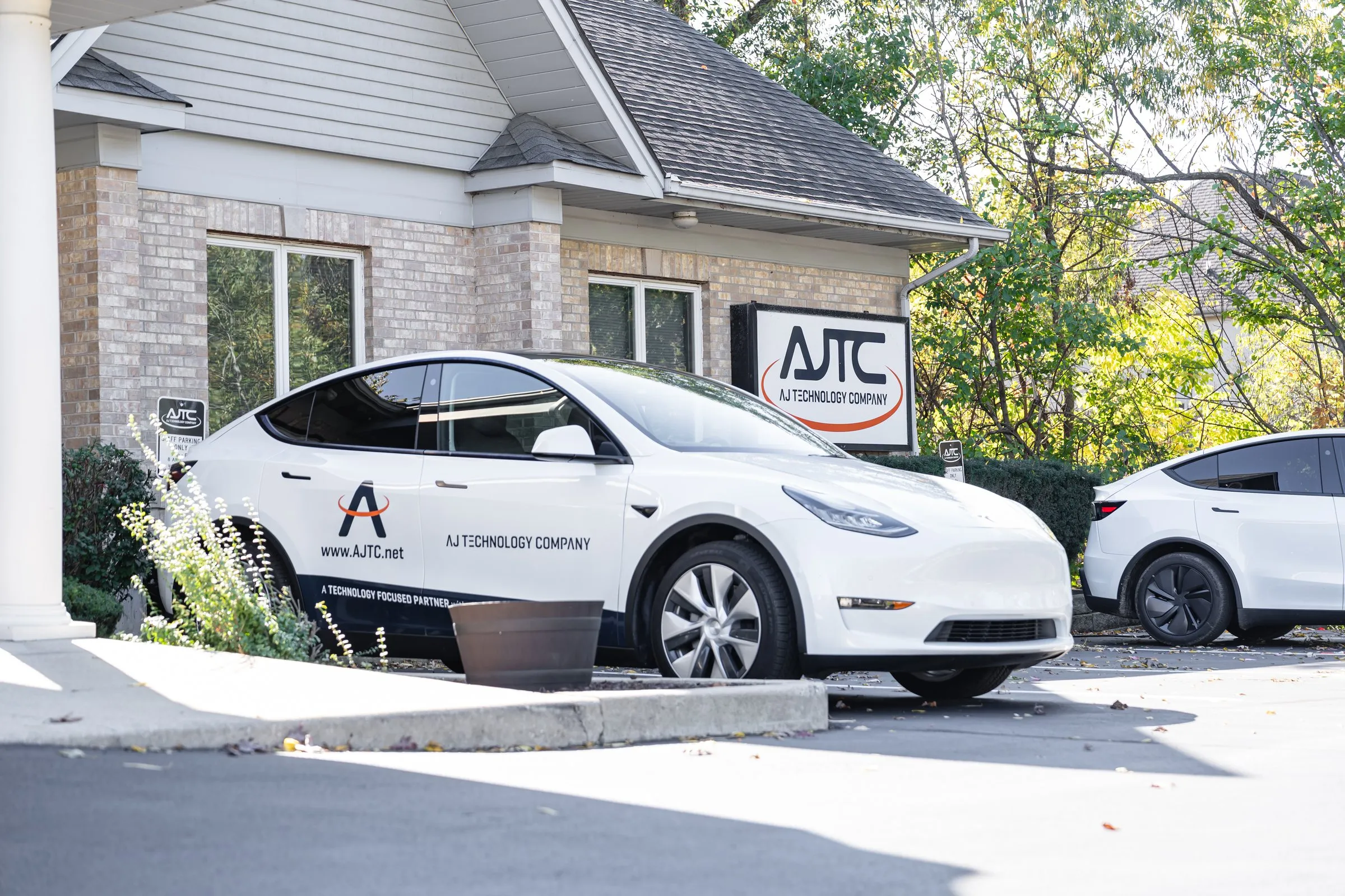 AJTC headquarters in Homer Glen with an AJTC service vehicle