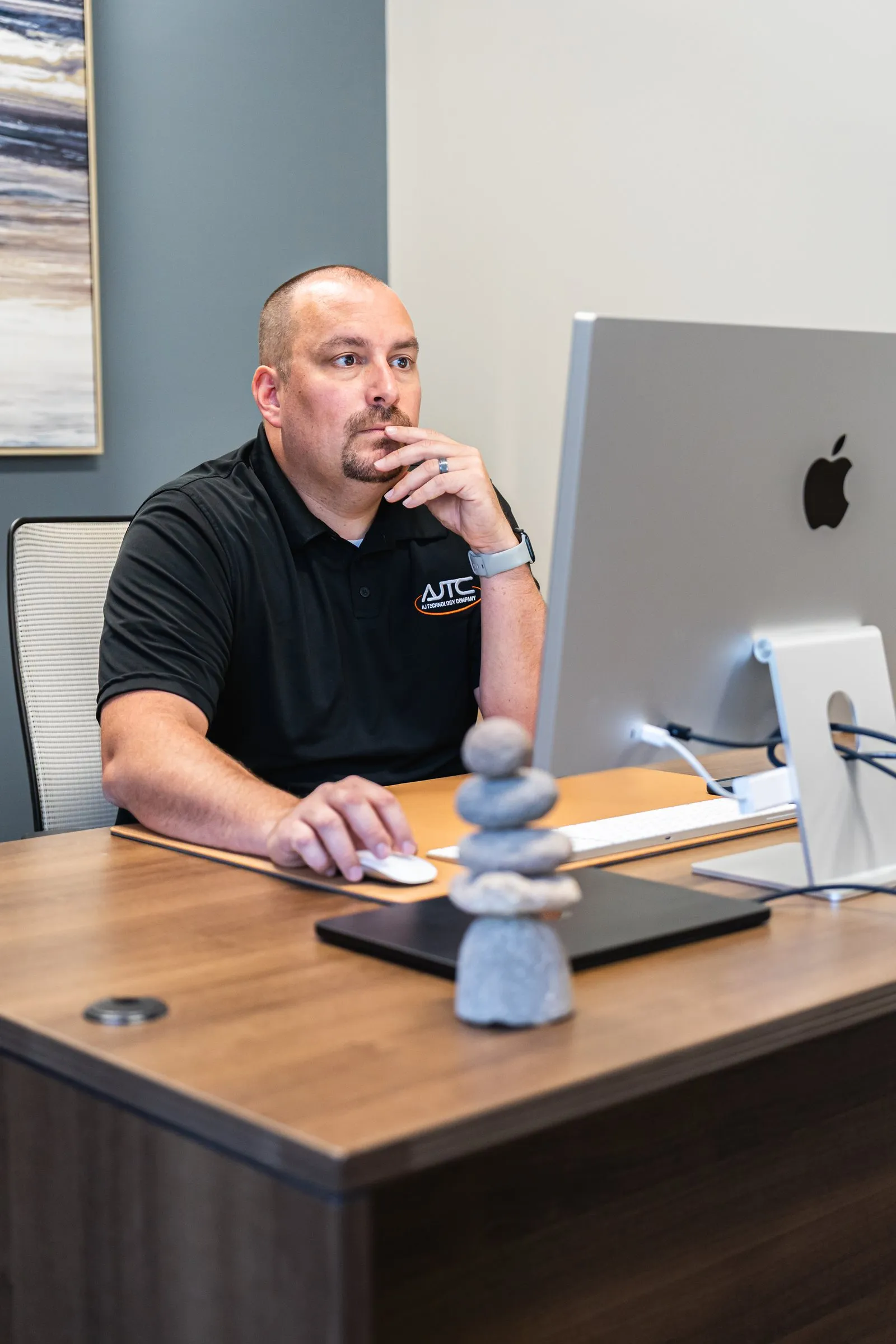 AJTC business development manager Patrick Maier at his desk