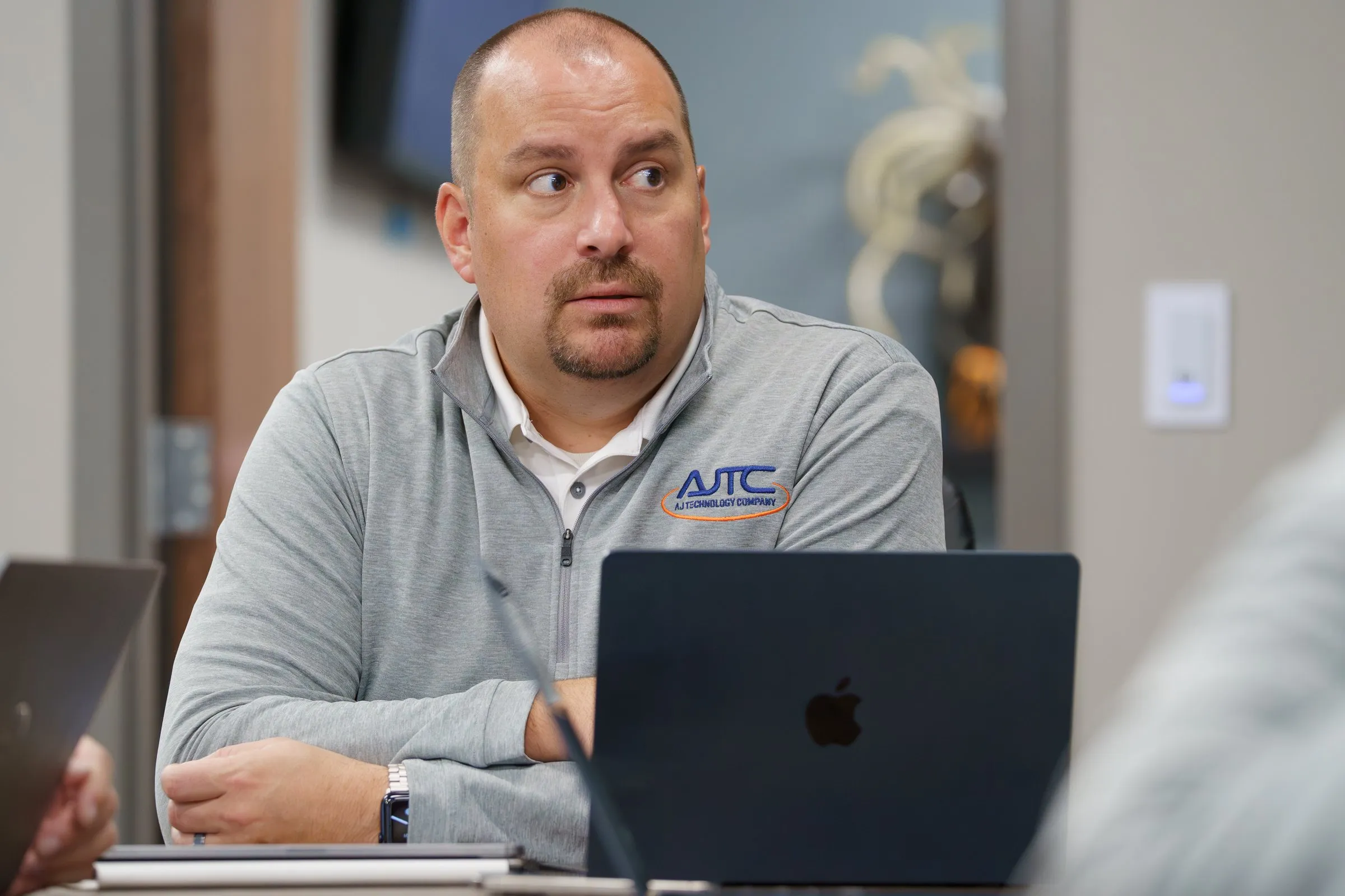 AJTC business development manager Patrick Maier in a client meeting