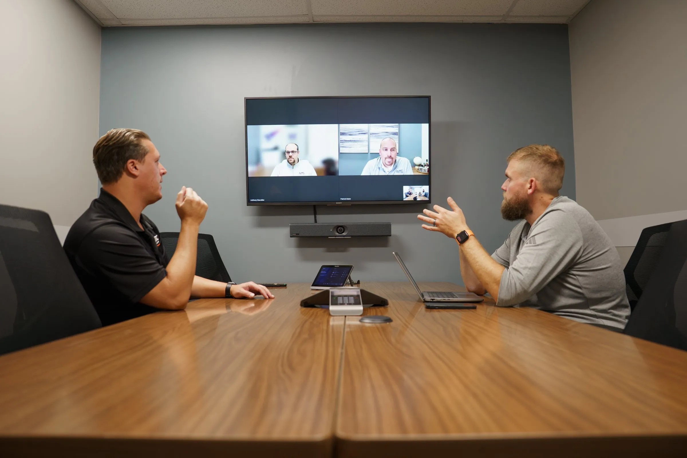AJTC engineers in a project planning meeting