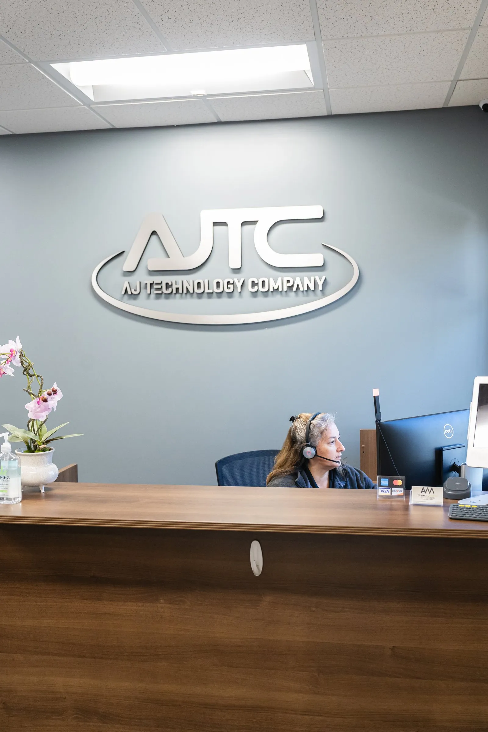 Tina, AJTC office manager, at the Chicago front desk