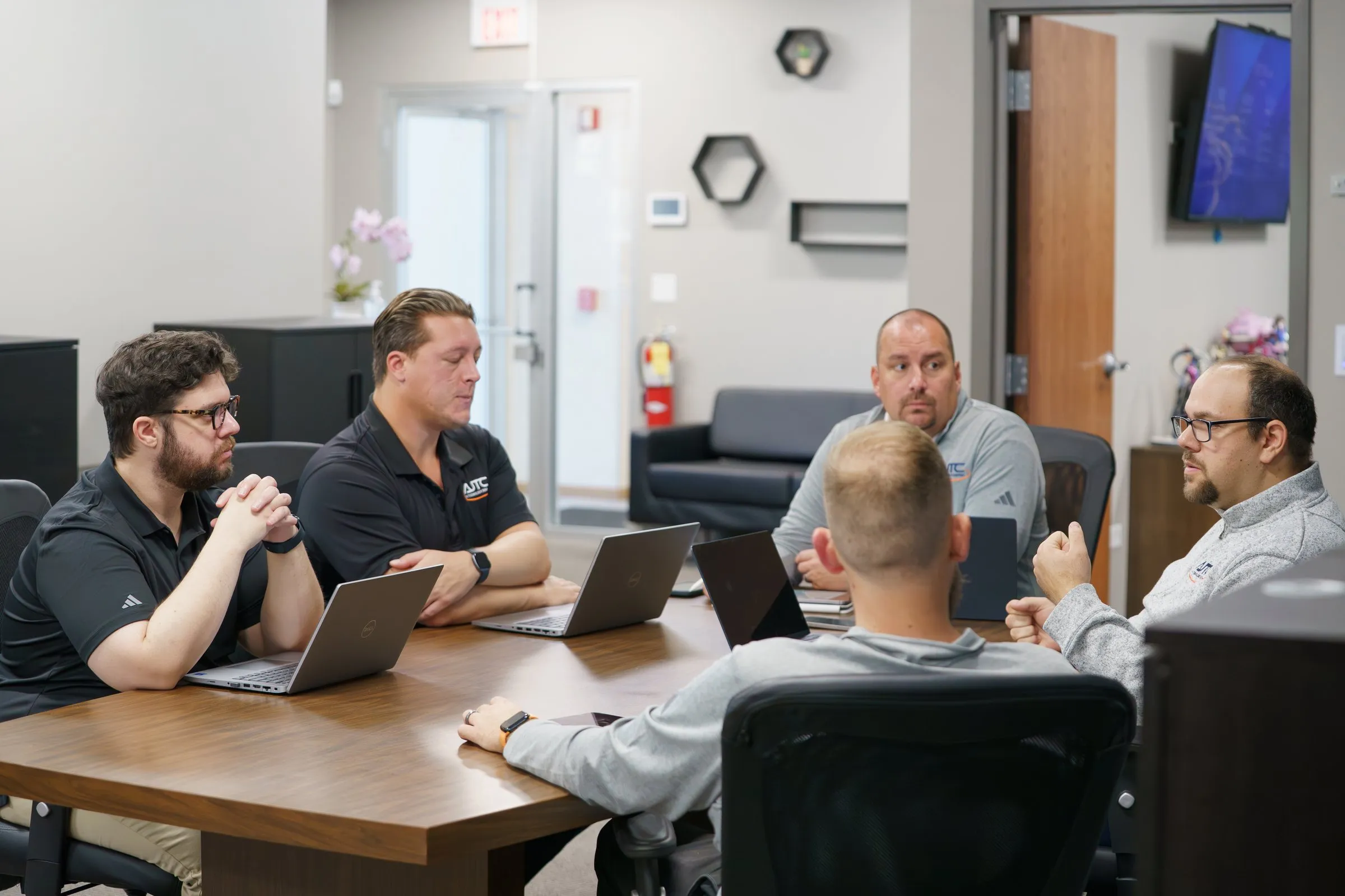 AJTC Chicago team in a weekly meeting