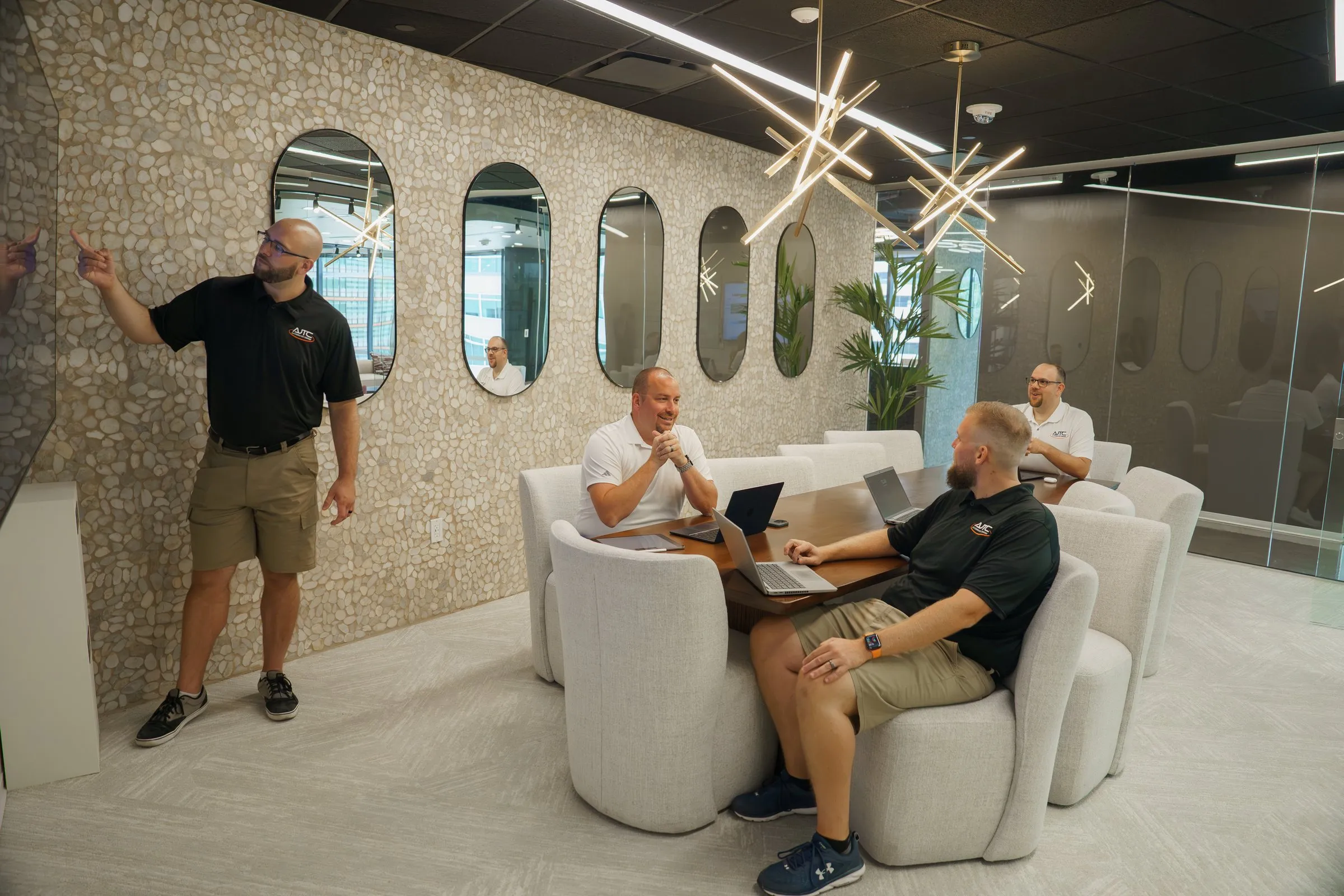 AJTC Phoenix team in a client review meeting